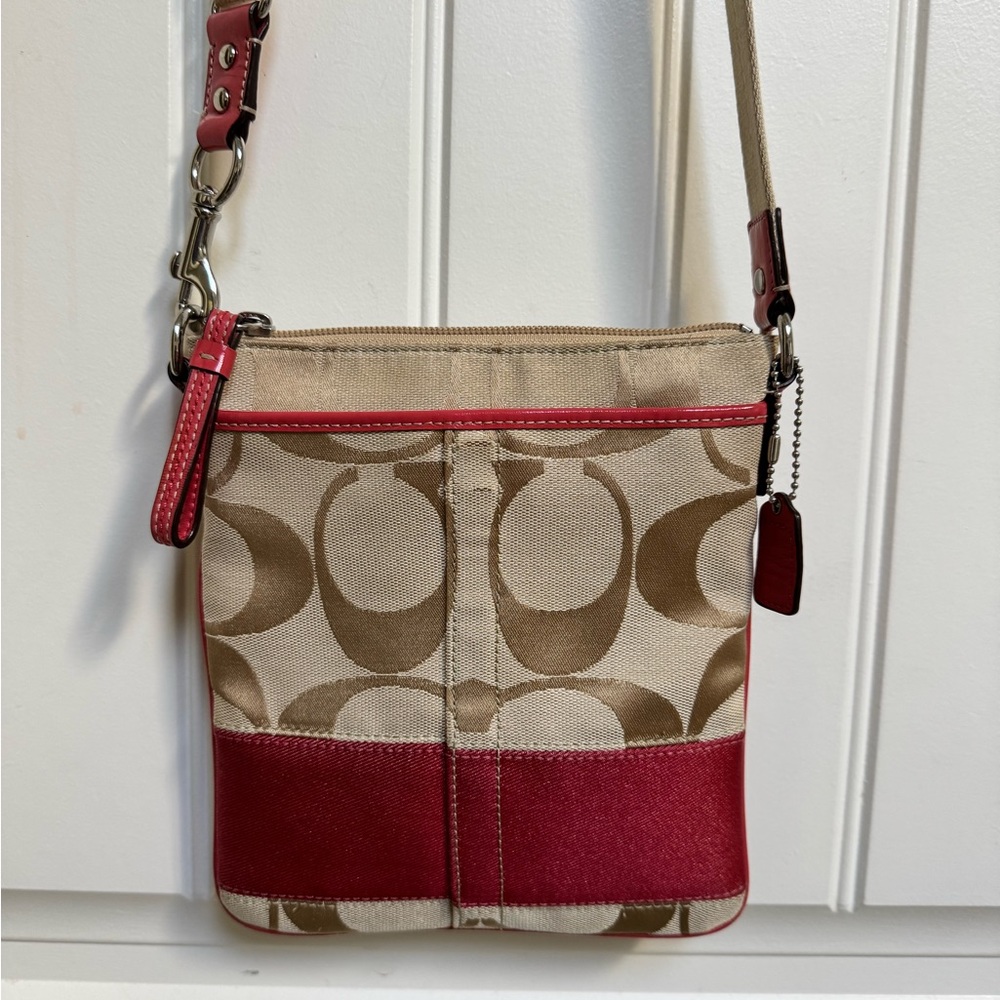 Coach Signature Canvas Tan and Coral Red Canvas Crossbody Bag with Leather Trim.